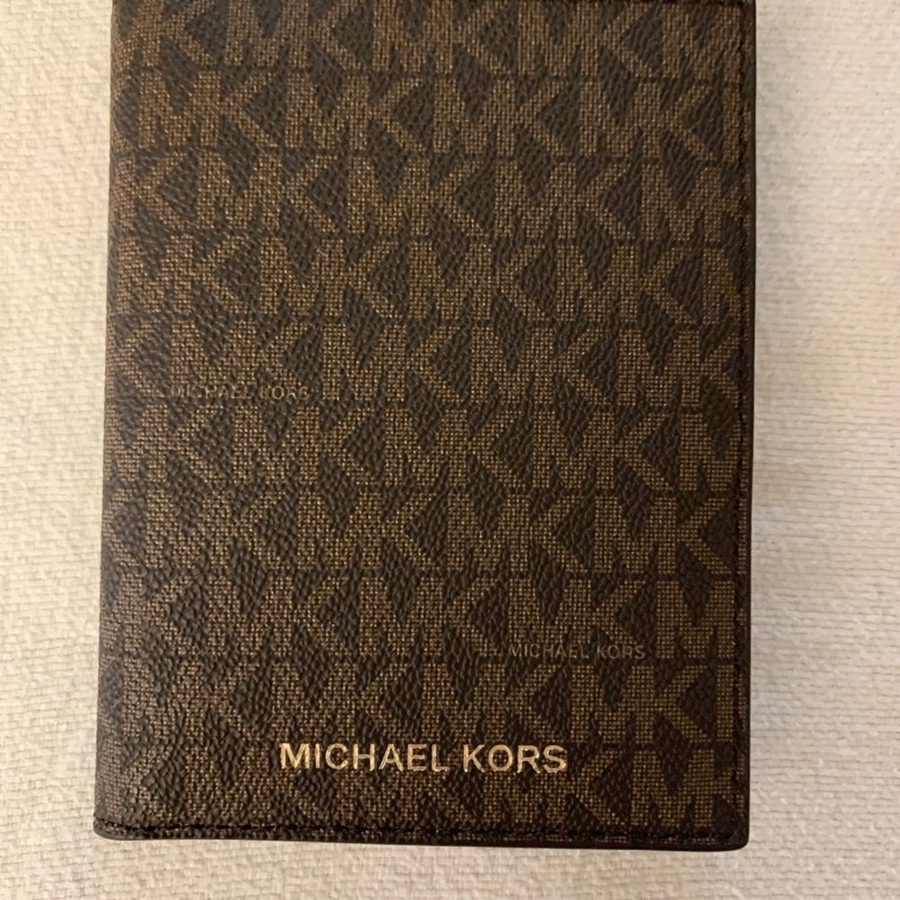 New without tags - Michael Kors Brown Monogram Passport Wallet